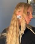 Scooter Sun and Eye Clip-On Earrings in Silver Galvanized Resin — vidéo