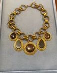 Edouard Rambaud 1980s Gold-Tone and Wood Charm Necklace — vidéo