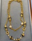 1980s Double Pearl Sautoir, Golden Metal and Resin — vidéo